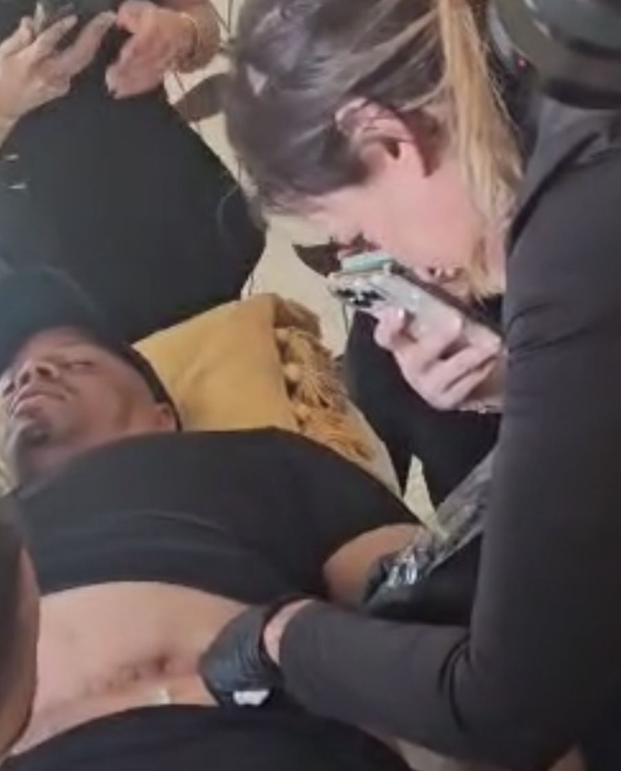 Rebecca Matthews performing scar camouflage with magnification